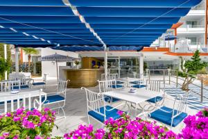 Reštaurácia alebo iné gastronomické zariadenie v ubytovaní Hotel Mongibello Ibiza