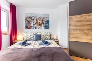 Posteľ alebo postele v izbe v ubytovaní Ferienwohnung Katharina