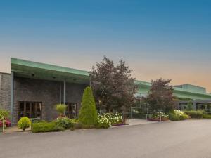 a building with a lot of plants in front of it at The Connacht Hotel in Galway