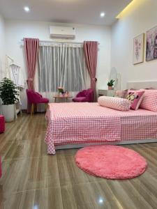 Postel nebo postele na pokoji v ubytování Nhà Nghỉ Huyền Anh