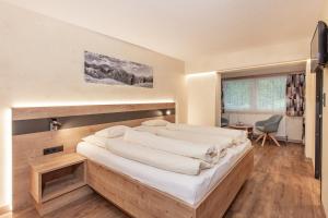 Postel nebo postele na pokoji v ubytování Haus Manfred