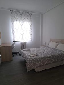 Posteľ alebo postele v izbe v ubytovaní Piso Revellin