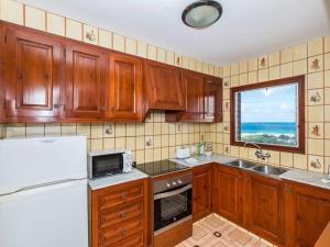 A kitchen or kitchenette at Great Son Bou Villa Casa Lucia 3 Bedroom Family Villa Large Spacious Pool Area Sea Views