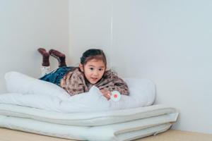 Postel nebo postele na pokoji v ubytování Global Resort Misen - グローバルリゾート弥山