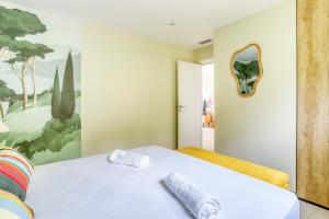 Llit o llits en una habitació de Superbe T4 -Vue Mer- Tout Confort Refait à Neuf!