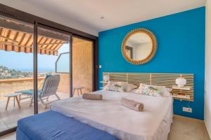 Llit o llits en una habitació de Superbe T4 -Vue Mer- Tout Confort Refait à Neuf!