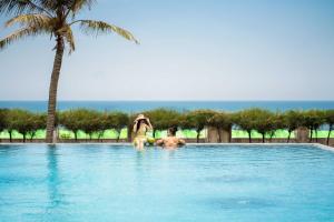 Bazén v ubytování Tam Thanh Beach Resort & Spa nebo v jeho okolí