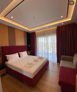 Postel nebo postele na pokoji v ubytování The View Hotel Ksamil + 79 fotografií