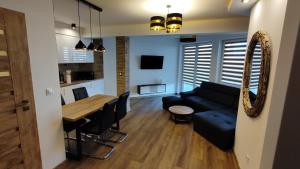 Кухня или мини-кухня в Darłówko Apartament Morski XIII
 +4 фотографии