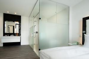 Postel nebo postele na pokoji v ubytování INNSiDE by Meliá Leipzig