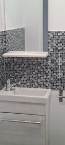 Ένα μπάνιο στο Apartament 3 camere, doua bai integral pentru familie sau grup +27 φωτογραφίες