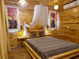 Postel nebo postele na pokoji v ubytování D&D Eco Sapa + 37 fotografií