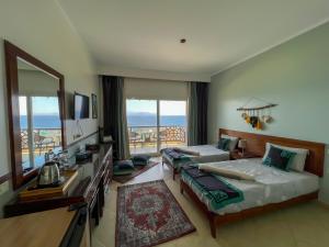 TV a/nebo společenská místnost v ubytování Club Red Dahab Motel