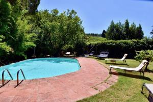 The swimming pool at or close to Molino in chianti