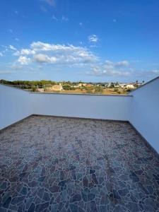 a room with a roof with a tile floor at Adosado Vinaròs in Vinaròs +17 photos
