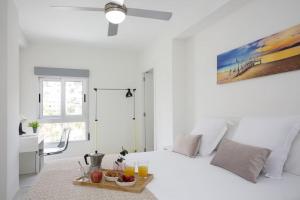 Postel nebo postele na pokoji v ubytování SingularStays Cullera V