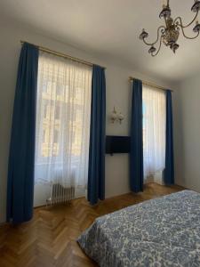 Postel nebo postele na pokoji v ubytování Klimtsuites