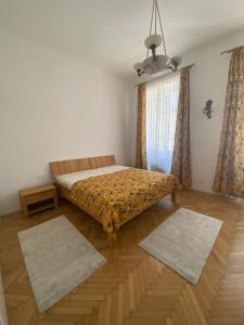 Postel nebo postele na pokoji v ubytování Klimtsuites