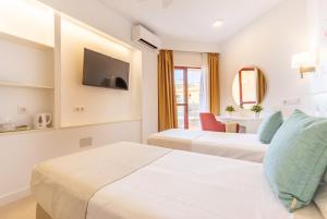 Postel nebo postele na pokoji v ubytování Hotel Angela - Adults Recommended