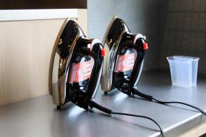 a pair of golf clubs sitting on top of a counter at Richmond Hotel Yokohama-Bashamichi in Yokohama