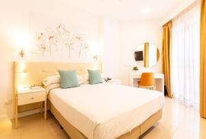 Postel nebo postele na pokoji v ubytování Hotel Angela - Adults Recommended