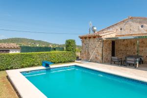 Poolen vid eller i närheten av Vacaciones ideales en Villa Fernando con piscina!