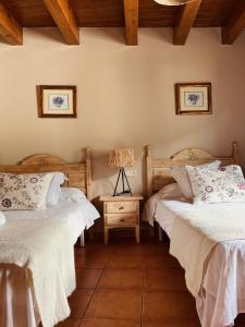 Postel nebo postele na pokoji v ubytování Casa Moline Apartamentos Rurales + 37 fotografií