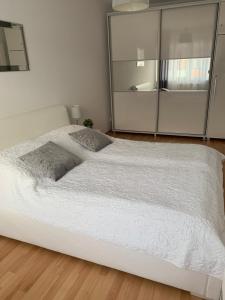 Posteľ alebo postele v izbe v ubytovaní Apartament Halina