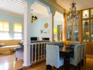 a dining room with a table and chairs at 3BR Venetian-style Villa in Mytilene City Centre in Mytilini
