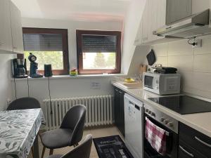 Kuchyň nebo kuchyňský kout v ubytování Ferienwohnung Andreea