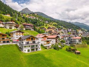 a small village on a hill with houses at Apartments in Kappl/Paznauntal 36440 in Kappl