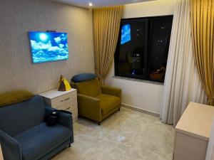 TV a/nebo společenská místnost v ubytování Kleopatra Twin Towers