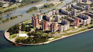 an aerial view of an island in the water at Hostel 5 Сapsule Rooms in Ustʼ-Kamenogorsk