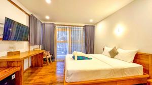 Letto o letti in una camera di Serene Beach Villa