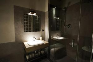 Een badkamer bij Appartamento Gemma Grigia-tavoleto