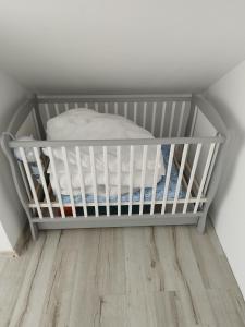 Ένα ή περισσότερα κρεβάτια σε δωμάτιο στο Apartament przy Wieży