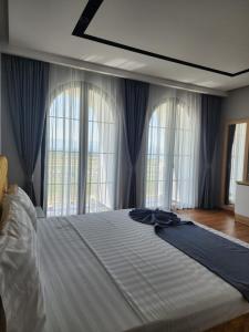 Postel nebo postele na pokoji v ubytování Imperador Palace Hotel Restorant
