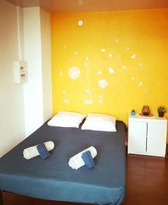 Postel nebo postele na pokoji v ubytování Cozy Studio Strasbourg