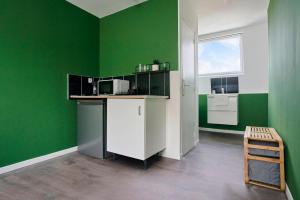 Kuchyň nebo kuchyňský kout v ubytování NG Prestige - Lille I Roubaix Jouffroy - Netflix - Wifi + 20 fotografií