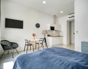 Kuchyňa alebo kuchynka v ubytovaní Porta Downtown Apartments by Irundo