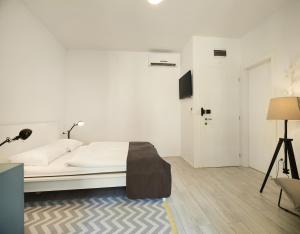 Posteľ alebo postele v izbe v ubytovaní Porta Downtown Apartments by Irundo