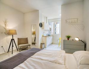 Posteľ alebo postele v izbe v ubytovaní Porta Downtown Apartments by Irundo
