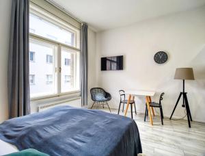 Posteľ alebo postele v izbe v ubytovaní Porta Downtown Apartments by Irundo