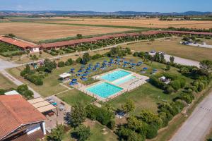 an aerial view of a resort with a swimming pool at Residenza Principina in Principina Terra