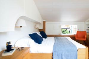 Postel nebo postele na pokoji v ubytování Casa Margaux by PortofinoHomes