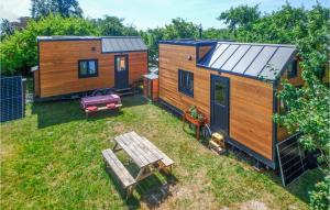 an aerial view of a tiny house with a picnic table at Cozy Home In Mayrhof With House A Panoramic View 