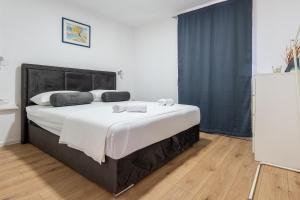 Ein Bett oder Betten in einem Zimmer der Unterkunft Villa Ivanka