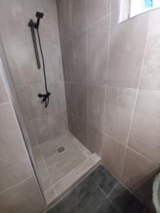 Kúpeľňa v ubytovaní Boglárka Vendégház Tiszalök