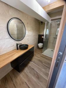 Koupelna v ubytování six fours les plages logement maison