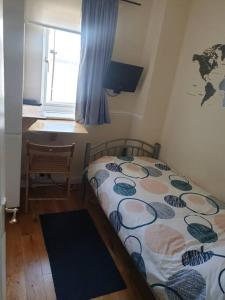 Ένα ή περισσότερα κρεβάτια σε δωμάτιο στο Seaview